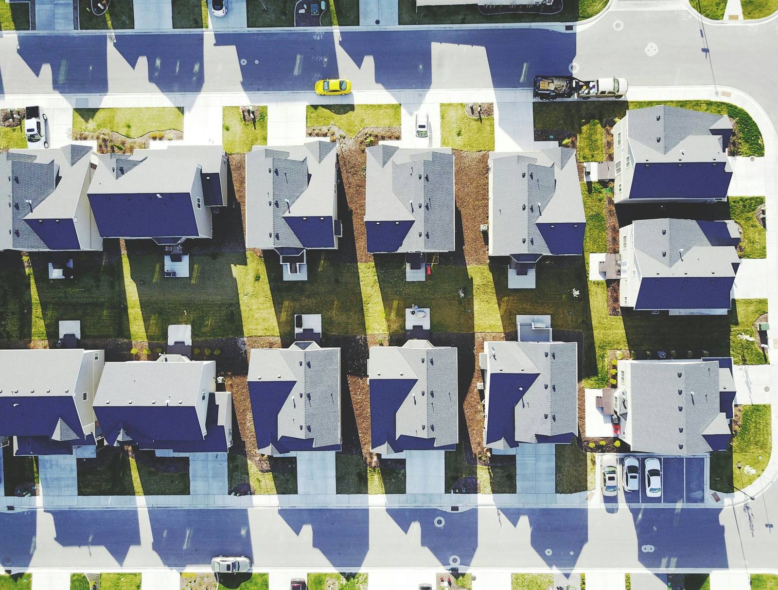 Aerial view of a neighborhood of homes and trees